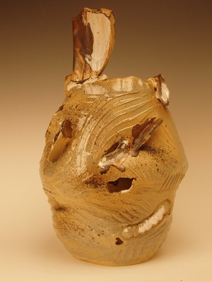 Inserts, thrown, carved, altered, stoneware and porcelain, glazes, bronze luster. 14 in ht x 9 in width x 9 in depth