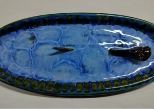 When your dinner comes to you...19" x 8" x 2.5", ceramic sculpture, $250